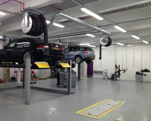 Cars on hydraulic lifts at Lambeth College