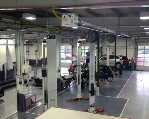 cars on Hydraulic lifts at Citroen Birmingham